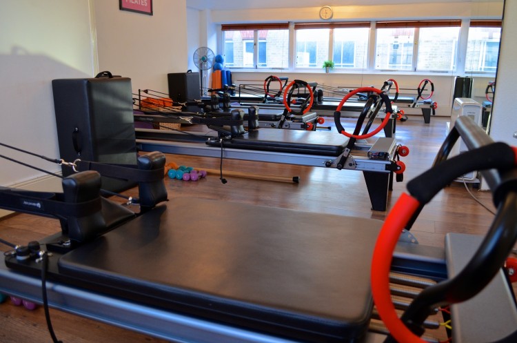 What Are the Benefits of Reformer Pilates Over Mat Pilates?